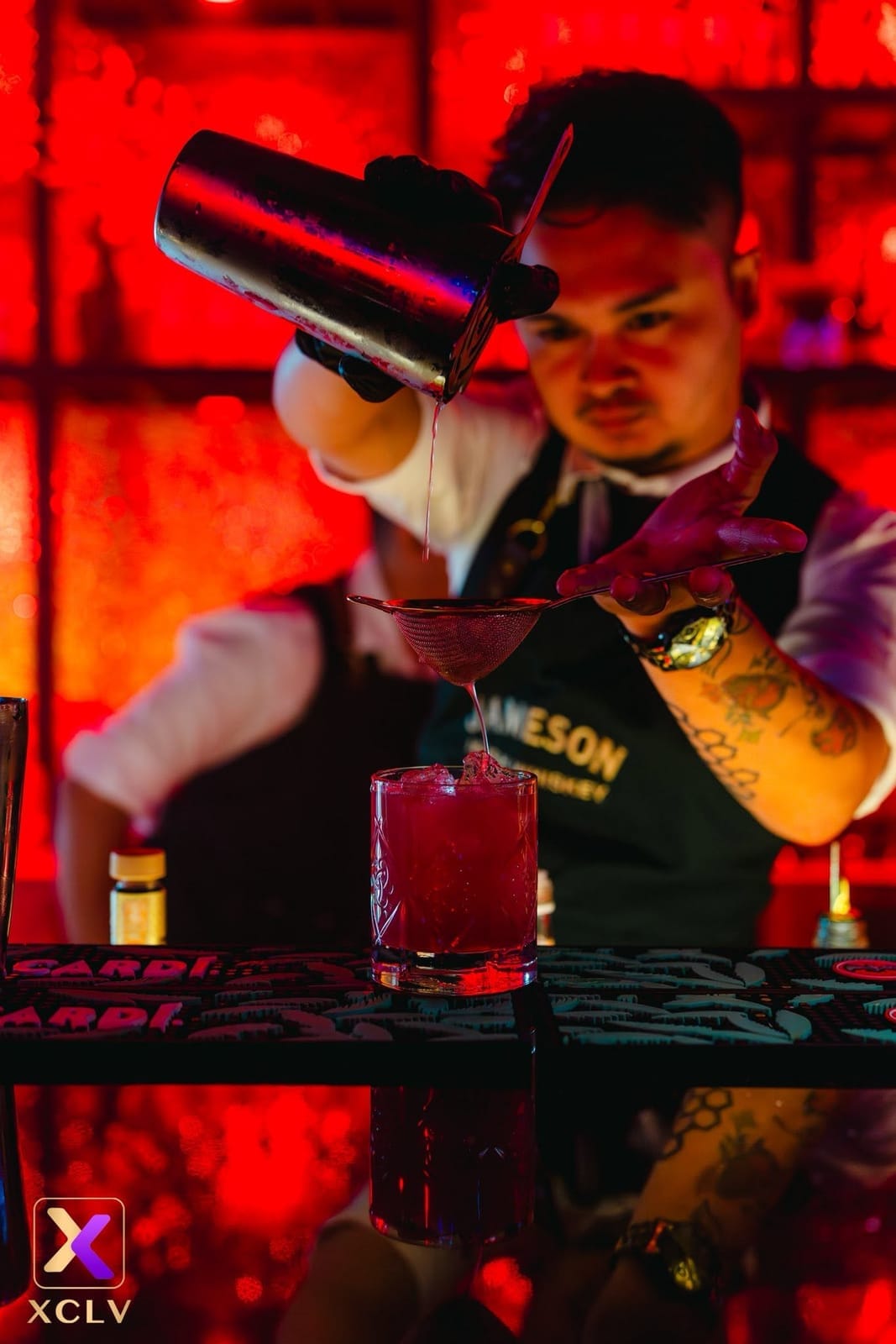 Bartender preparing a cocktail at XCLV